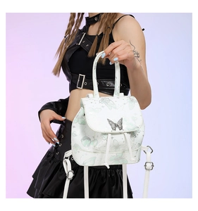 White faux leather backpack with green butterfly prints and silver butterfly buckle