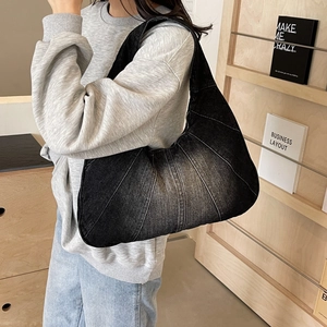 Retro washed black denim crescent shoulder bag with large capacity and patchwork detail