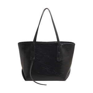 Large black vintage tote bag in embossed faux leather with long shoulder straps