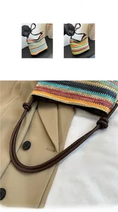 Close-up of a colorful striped woven bag with dark brown knotted leather shoulder straps