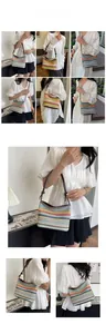 Detailed model view of the colorful rainbow woven straw shoulder bag with leather straps