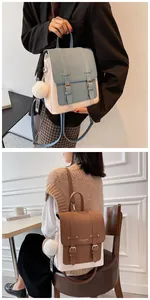 Detail of British style contrast PU leather backpack with buckle straps and plush pompom