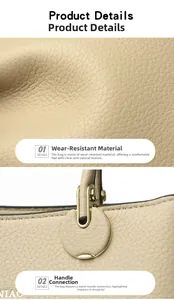 Detailed view of beige pebble grain leather texture and metallic handle hardware