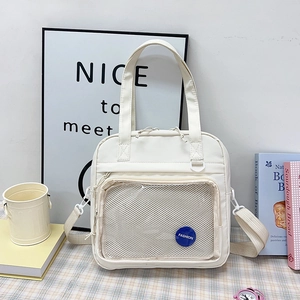 Minimalist beige multi-purpose bag with transparent mesh front pocket and fashion badge