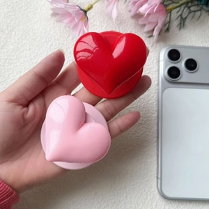 Stereo heart magnetic phone socket grip in vibrant red and soft pink high gloss finish