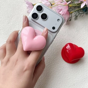 Glossy 3D heart-shaped magnetic phone grip and expanding stand in pink and red
