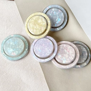 Shell texture phone socket grip stand in assorted pastel pearlescent mica colors