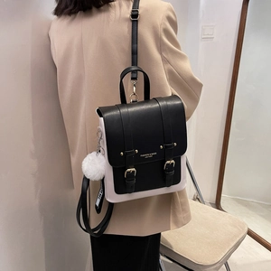 Contrast PU leather backpack for women featuring a minimalist black and white modern design