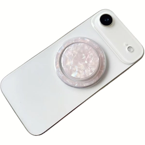 Pink shell texture magnetic phone socket grip holder on white smartphone back view