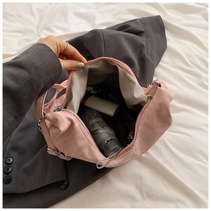 Pink glossy tote bag interior showing spacious capacity for umbrellas and cosmetics