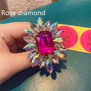 Luxurious large floral ring with rose red gemstone and colorful marquise crystals