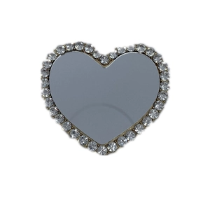 Support de téléphone cœur argenté avec miroir et bordure scintillante en strass