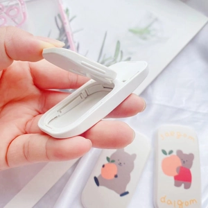 Cartoon cherry bear foldable stand for mobile phones with cute bear and peach patterns