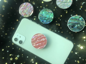 Macro detail of foldable phone sockets with natural iridescent shell texture design