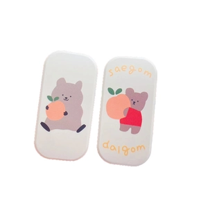 Cartoon cherry bear retractable phone stand set with cute peach illustration on white surface