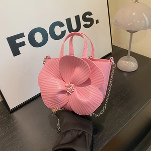 Pink 3D floral petal bucket bag with silver chain strap and top handle design