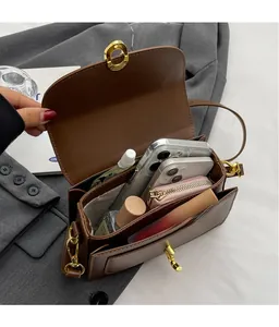 Detailed interior view of brown tofu bag showing main compartment and storage capacity
