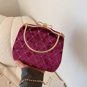 Sac de soirée luxueux en velours bordeaux avec losanges en strass et nœud doré