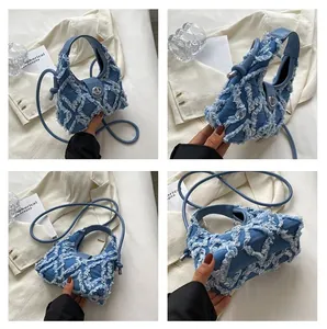 Detailed four-angle shots of mini blue denim quilted handbag with frayed fringe details