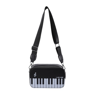 Fashionable piano themed shoulder bag with keyboard pattern and music note embroidery
