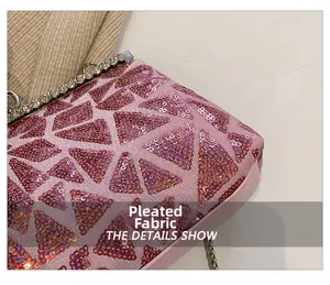 Macro detail of high-density pink sequins and sparkling rhinestone trim on an evening bag