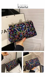 Close-up of colorful geometric sequin embroidery and sparkling rhinestone round handle