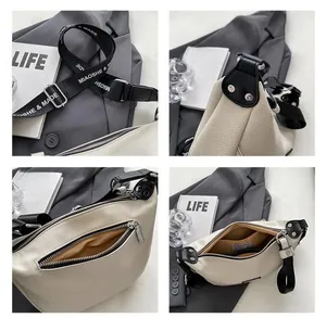 Detail shots of off-white lychee leather crossbody bag with logo strap and metal zippers