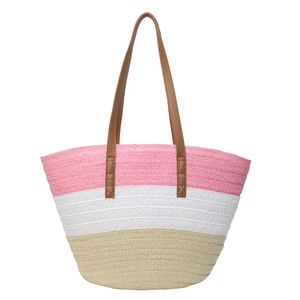 Three-color woven straw tote bag with brown leather handles on white background