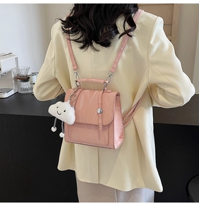 Pink PU leather backpack with wrinkled texture and cute white cloud charm detail