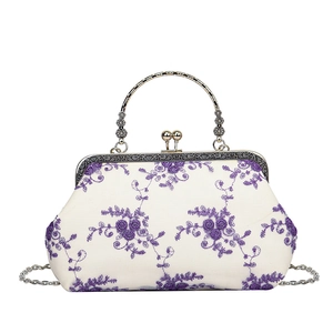Vintage embroidered floral handbag with purple flower pattern and metal clasp handle