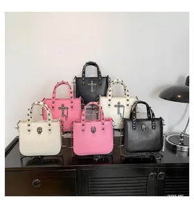 Gothic punk crossbody bags with metal studs, cross charms, and skulls in various colors