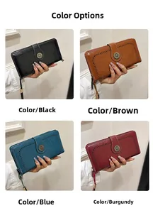 Detail view of long oil wax leather wallets in black, brown, blue, and wine red with sunflower buckle
