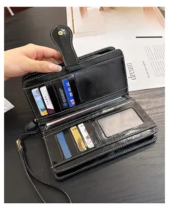 Internal view of black vintage oil wax leather wallet showing card slots and zipper pocket