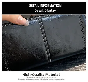 Macro shot of premium oil wax leather texture with white stitching on black clutch wallet