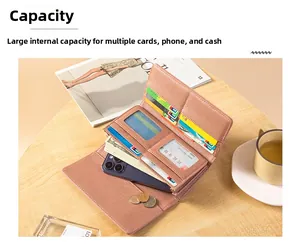 Detailed internal view of large capacity pink leather wallet showing card slots and phone compartment