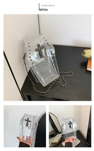 Detailed views of a coffin-shaped clear PVC bag with cross pendant and metal rivets