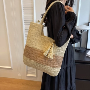 Large capacity woven tote bag with beige khaki color blocking and decorative tassels