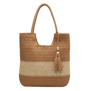 Large bohemian straw tote bag with brown and beige color block design and tassel