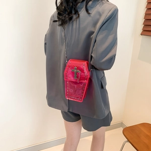 Pink transparent coffin crossbody bag with silver cross and metal chain strap