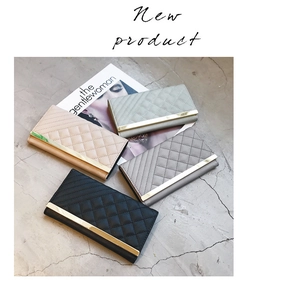 Quilted leather long wallets for women in black, grey, green and pink with gold detail