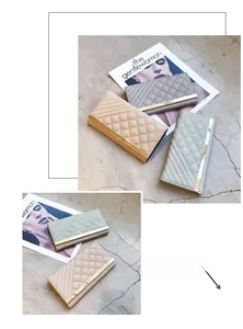 Detail showing quilted long wallets in beige and mint green with gold metal accents