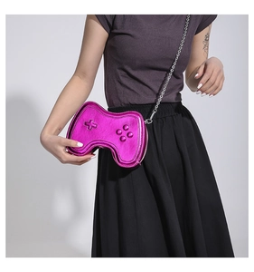 Creative game controller crossbody bag in metallic magenta pink with silver chain strap