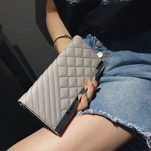 Quilted light gray long wallet for women with silver metal edge and trifold design