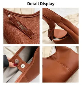 Dettagli della borsa in pelle caramello con texture, manico e chiusura magnetica