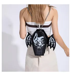 Gothic black coffin bag with bat wings and demon graphic shown on model back