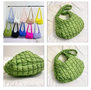 Detailed grid view showing various vibrant colors of the quilted cloud tote bag texture