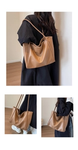 Detailed close-up showing the premium lychee texture on this large brown tote bag