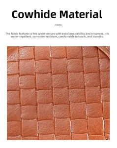Dettaglio macro del portafoglio in pelle intrecciata marrone caramello e pelle bovina
