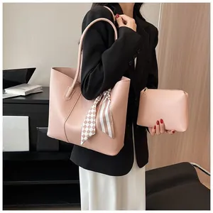 Pink matte leather tote bag with silk scarf detail and matching pouch for women