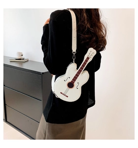 Detailed back view of a white guitar-shaped shoulder bag with silver hardware and PU leather